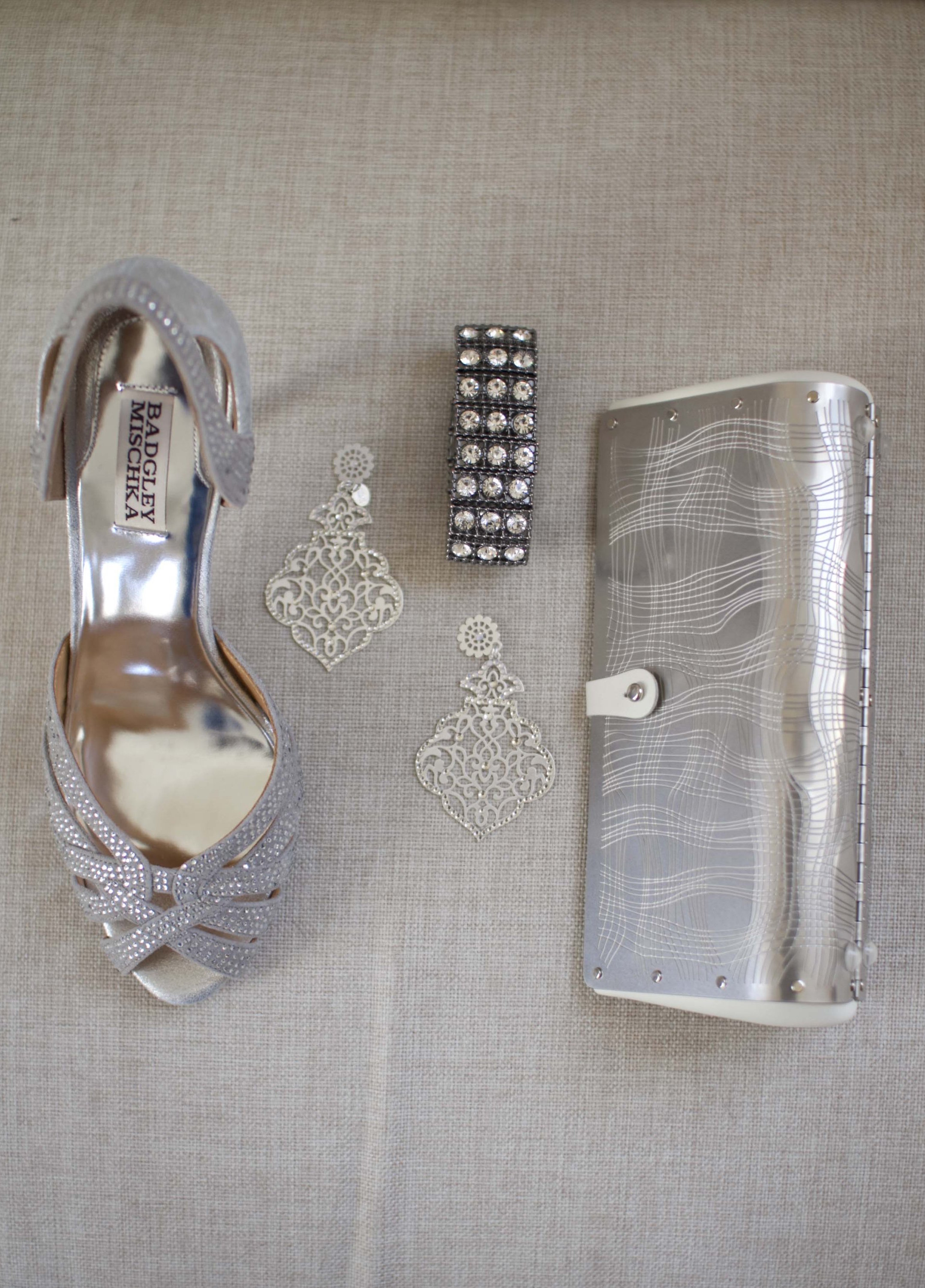 Gorgeous etched stainless clutch. Jewelry: Pronovias via Jones and Jones Baltimore & Francescas Atelier, Shoes: Badgley Mischka via The Little Shoebox
